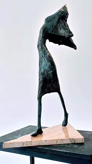   - NIKE - bronze patinated on a stone base