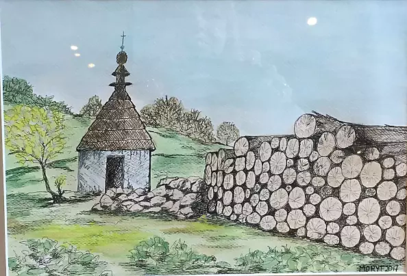 Maria Dąbrowska - A pile of wooden logs at the chapel - 2017