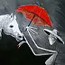 Romana Klinkosz - Beschritt mit rotem Regenschirm